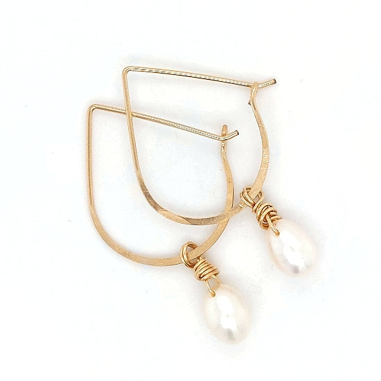 Gold hoop earrings with pearl drops